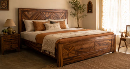 Solid sheesham wood bed with panel headboard styled in a warm, minimal Indian bedroom