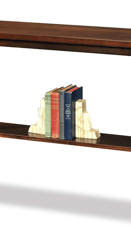 A brown solid Sheesham wood console table with a rectangular top and a lower shelf, featuring a stack of books on the shelf.
