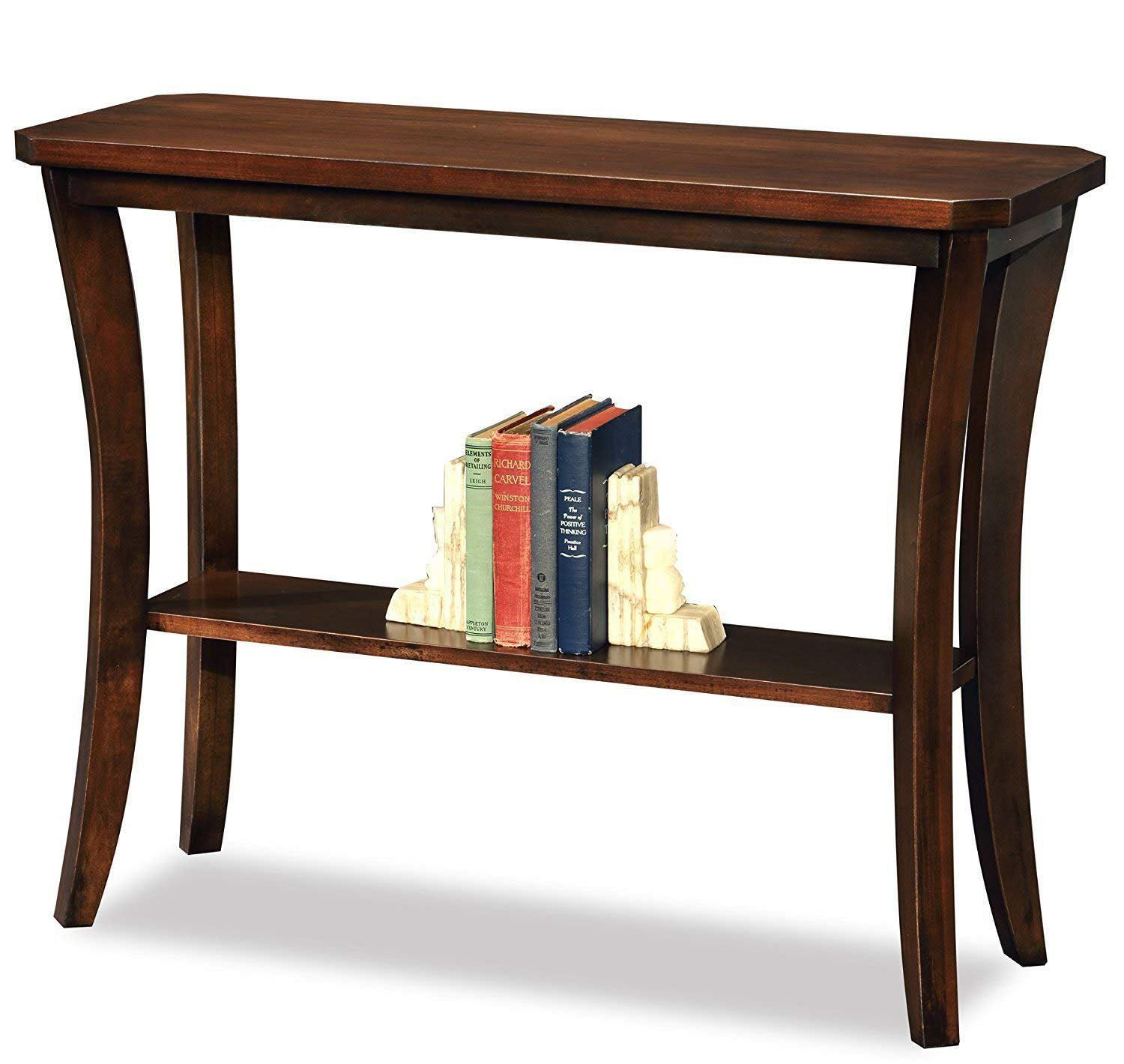 A brown solid Sheesham wood console table with a rectangular top and a lower shelf, featuring a stack of books on the shelf.