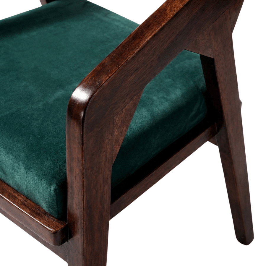 Chair with wooden frame and green cushion on a white background