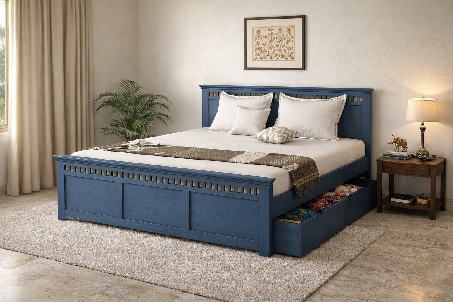Blue bed with storage drawers in a bedroom setting