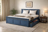Blue bed with storage drawers in a bedroom setting