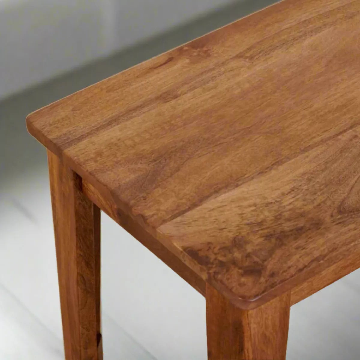 Close-up of a wooden bench seat