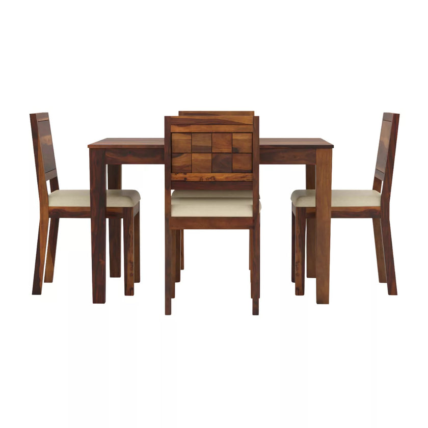 Wooden dining set with four chairs on a white background