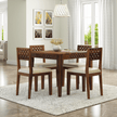 Wooden dining table set with chairs in a well-lit room.