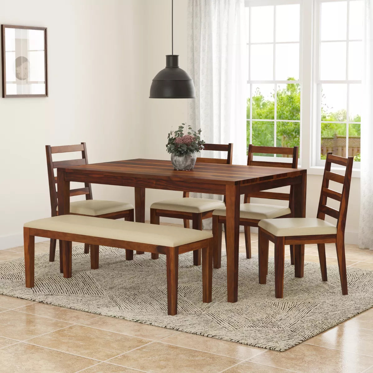 Wooden dining set with table, chairs, and bench in a bright room.