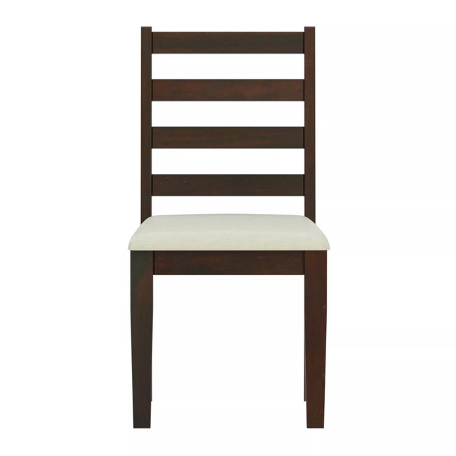 Wooden chair with a white cushion on a white background