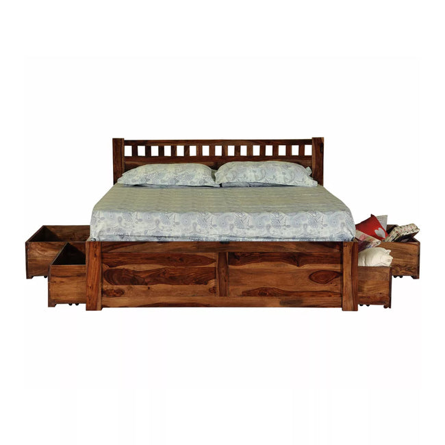 Wooden bed with storage drawers on a white background