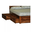 Wooden bed with storage drawers and a floral mattress on a white background