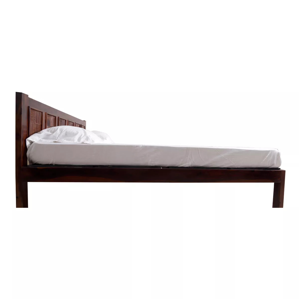 Wooden bed frame with white mattress on a white background