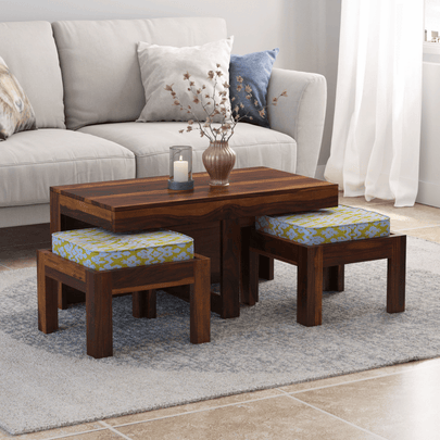 Wooden coffee table with stools in a living room setting