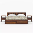 Wooden bed with matching side tables on a white background