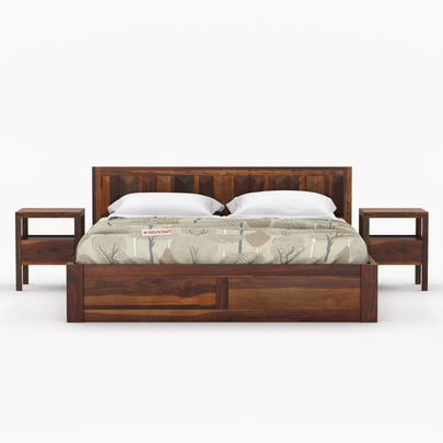 Wooden bed with matching side tables on a white background