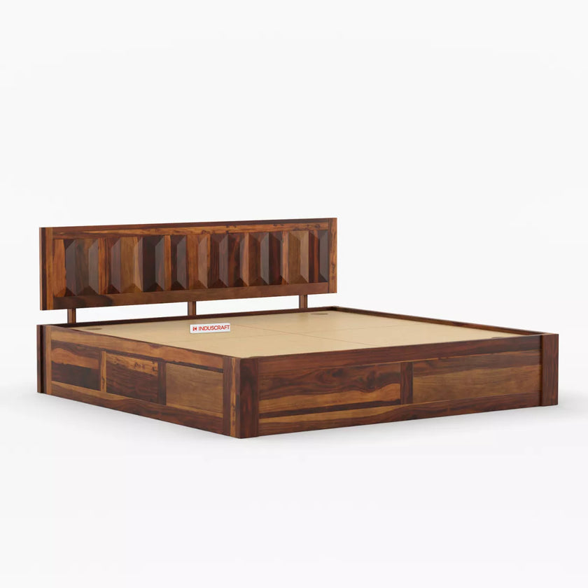 Wooden bed frame with a detailed headboard on a white background