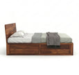 Low Profile Solid Wood Platform Bed with Storage in a White Background, Side View