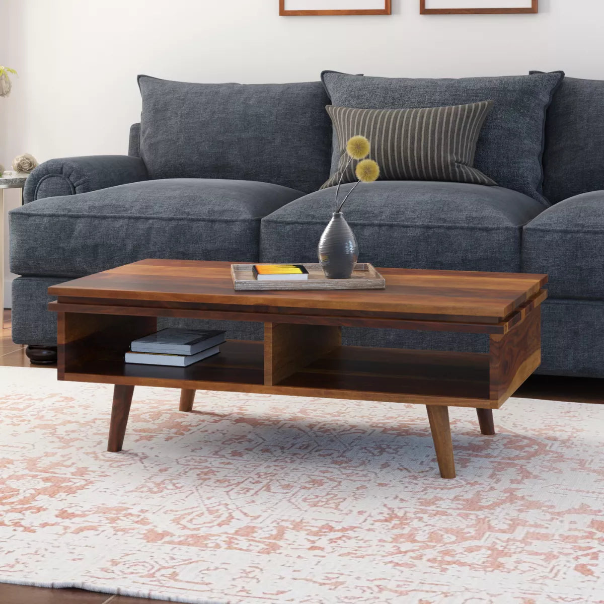 Milo Modern Rectangular Sheesham Wood Open Shelf Coffee Table in a Living Room