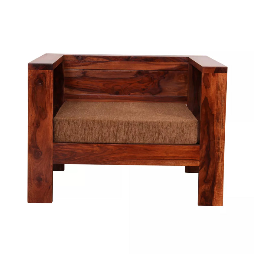 Wooden single seater sofa with a cushion on a white background