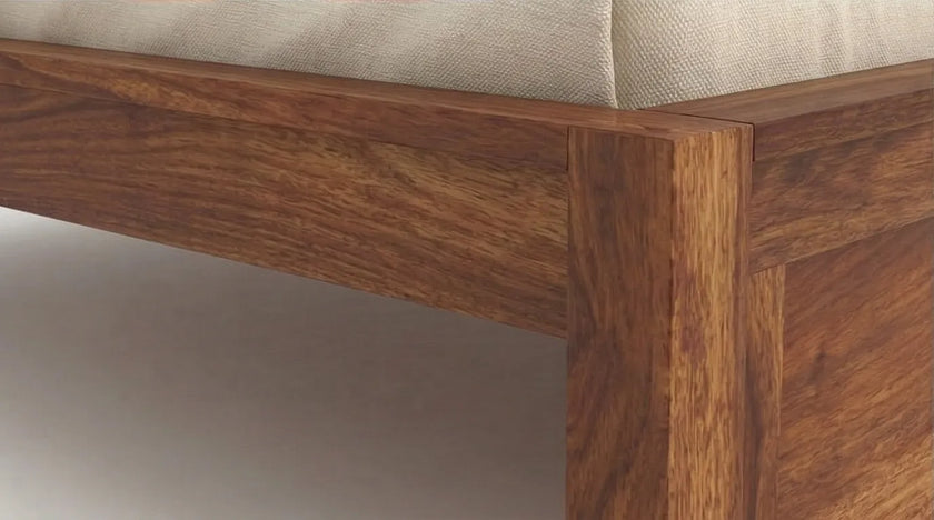 Solid Wood Bed Frame with Slatted Headboard in a White Background, Closeup View of Footboard