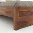 Solid Wood Storage Bed Frame with Tufted Headboard, White Background, Fooboard Closeup View