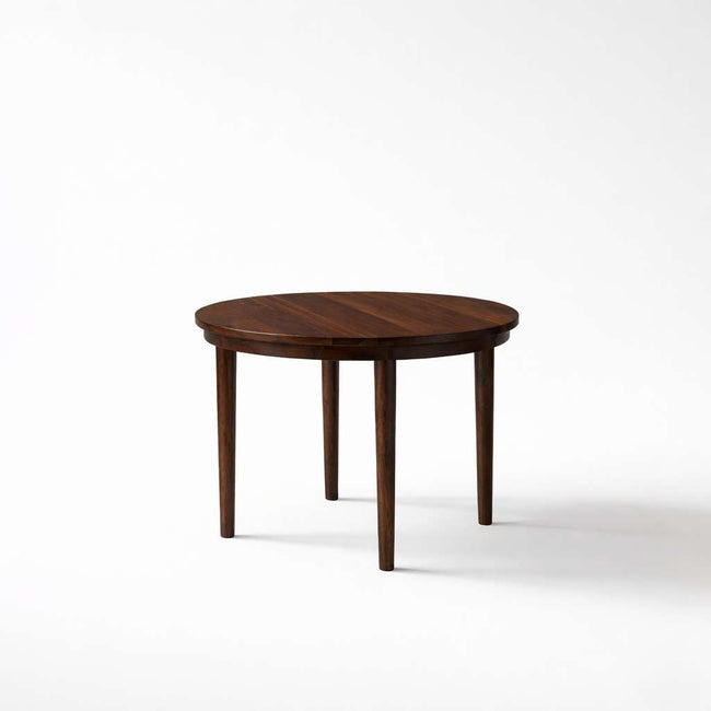 Wooden round table on a white background