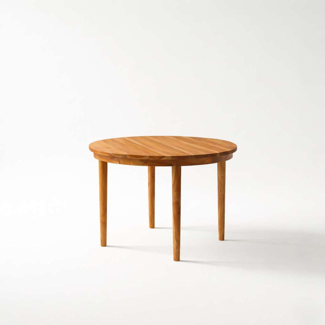 Wooden round table on a white background