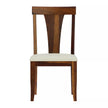 Wooden chair with a white cushion on a white background