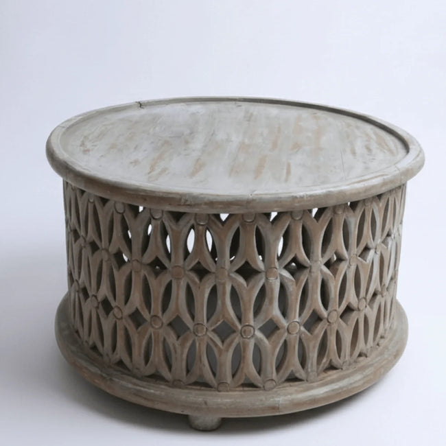 Aarav hand carved round wooden coffee table with white distressed jali pattern