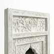 Close-up of the carved border pattern on the Aariz mirror frame