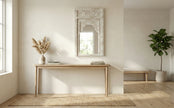Front view of the Aariz hand-carved Mughal arch wooden wall mirror in distressed vintage white