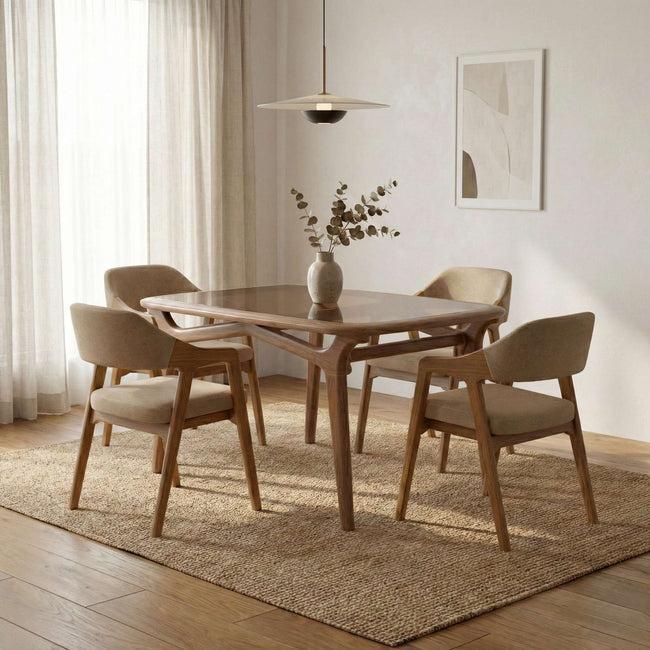 Brendon 4 seater glass top dining table with upholstered chairs in modern dining interior.