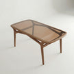 Rectangular glass top dining table with solid wood base from Brendon collection.