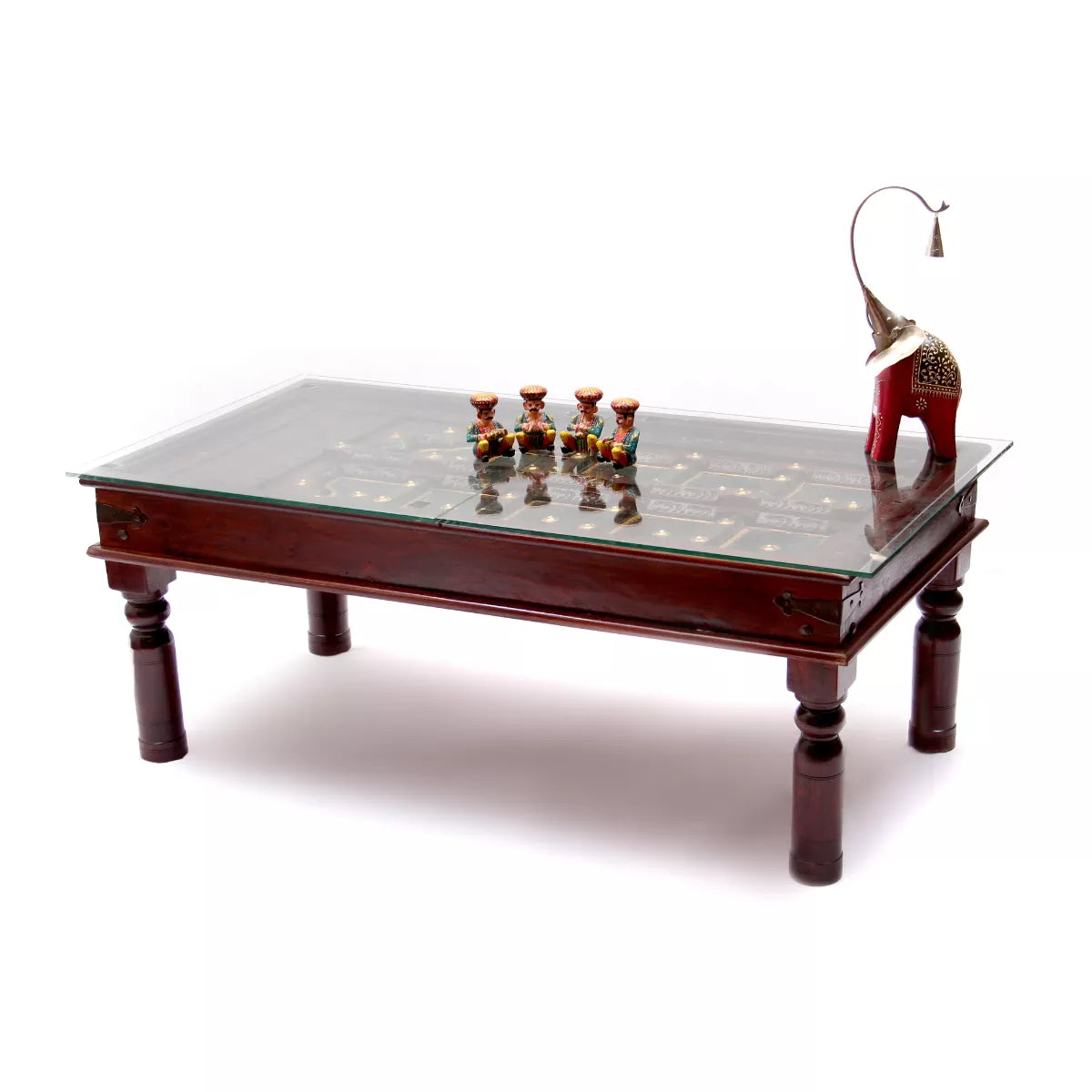 Rajasthani door panel center table with glass top styled with brass decor