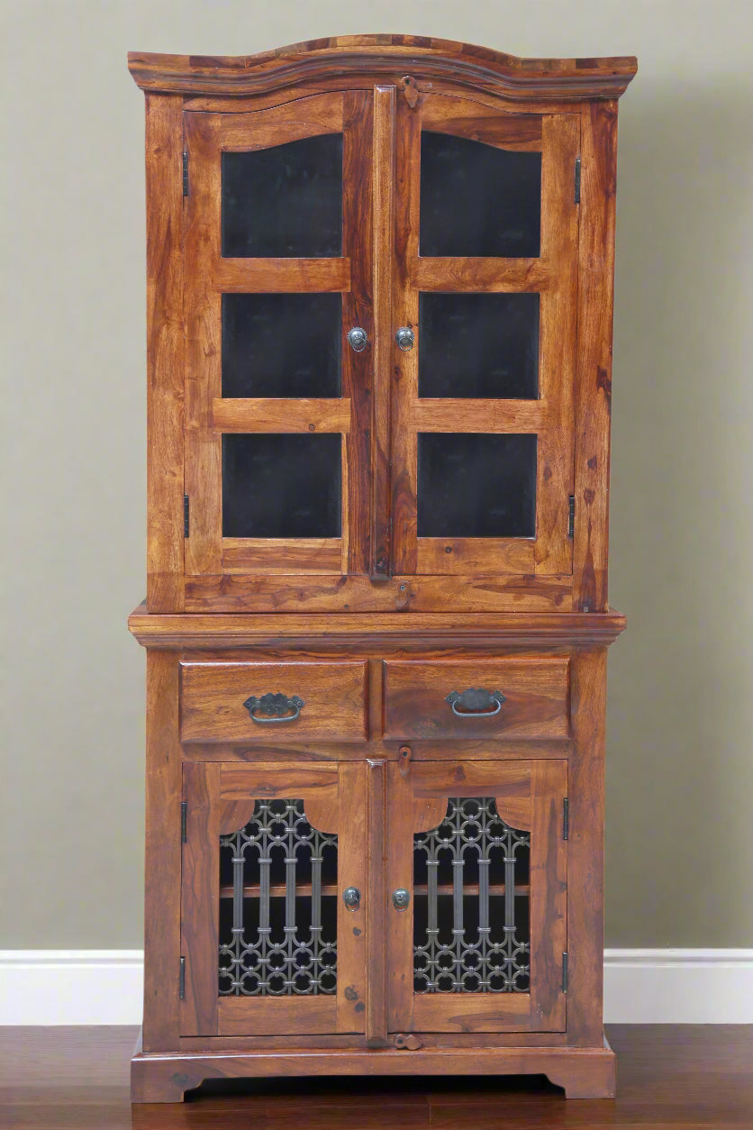 Wooden cabinet with glass doors and decorative metal grilles