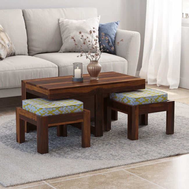 Khimsar sheesham wood rectangular coffee table with 2 cushioned stools in a living room