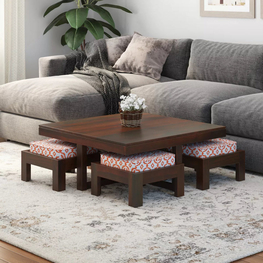 Khimsar modern square sheesham coffee table with 4 stools in dark teak finish in a living room