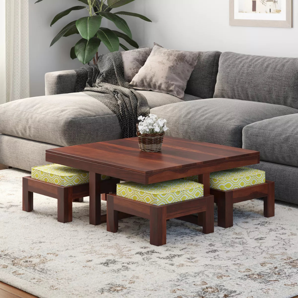 Khimsar modern square sheesham wood coffee table with 4 stools in honey teak finish in a living room