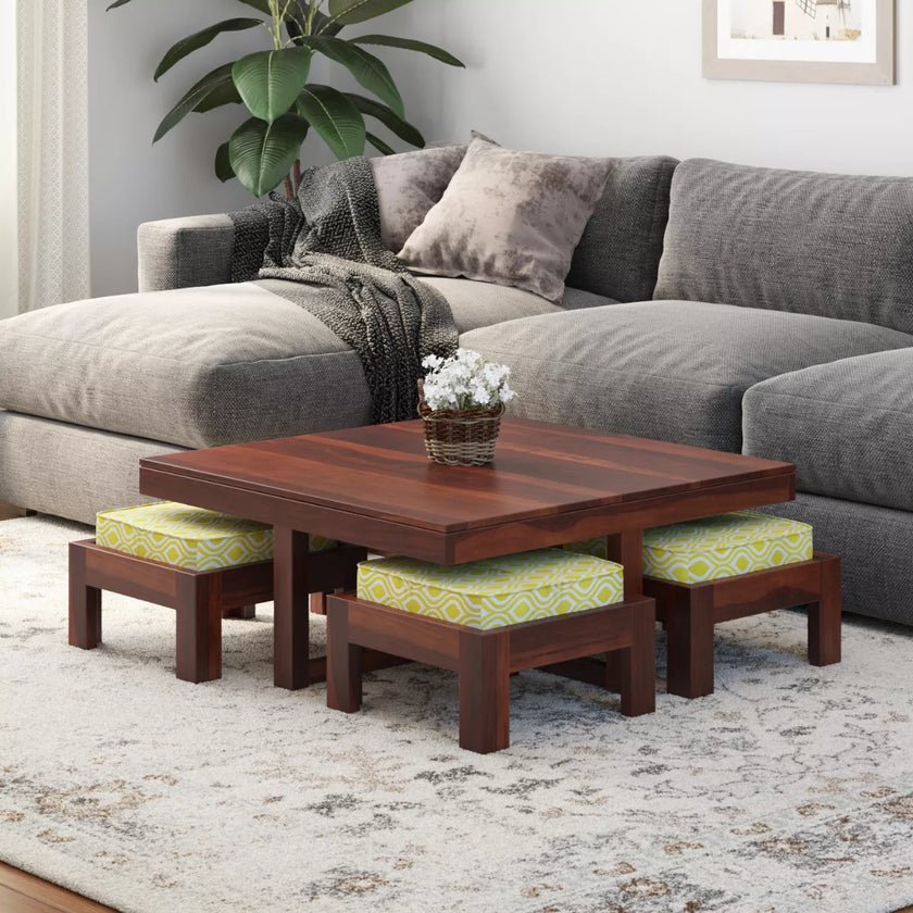 Khimsar modern square sheesham wood coffee table with 4 stools in honey teak finish in a living room