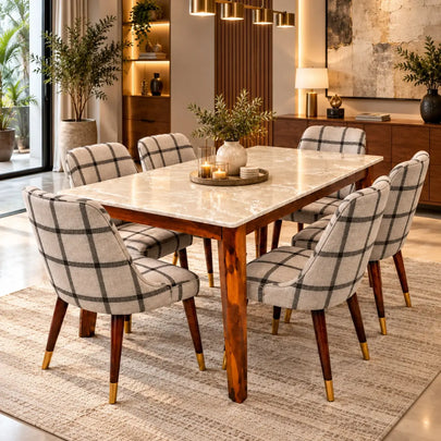 Marvaan marble top 6 seater dining table set with checkered upholstered chairs in a modern dining room