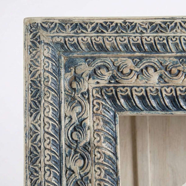 Close-up of hand-carved floral and geometric detailing on Meher Handcrafted Teak Wood Open Bookshelf Cabinet with distressed finish