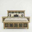 Front view of Meher Heritage solid teak wood bed frame featuring ornate hand-carved panels