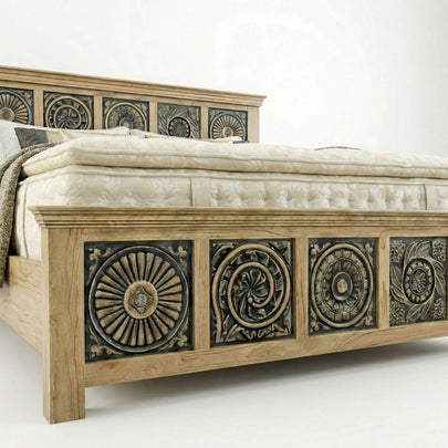 Close-up of Meher Heritage solid teak wood bed frame footboard showing detailed hand-carved decorative panels