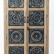 Front close-up view of intricate carved design on Meher rustic teak almirah