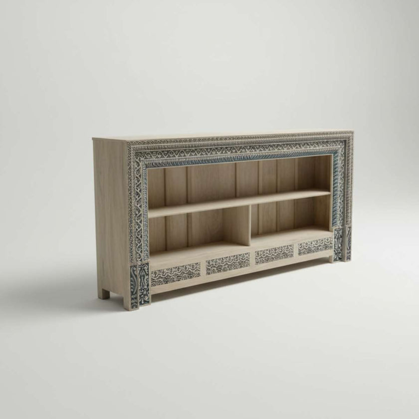 Front-left angle view of Meher rustic teak wood hand-carved open display cabinet highlighting detailed blue arabesque motifs on frame.