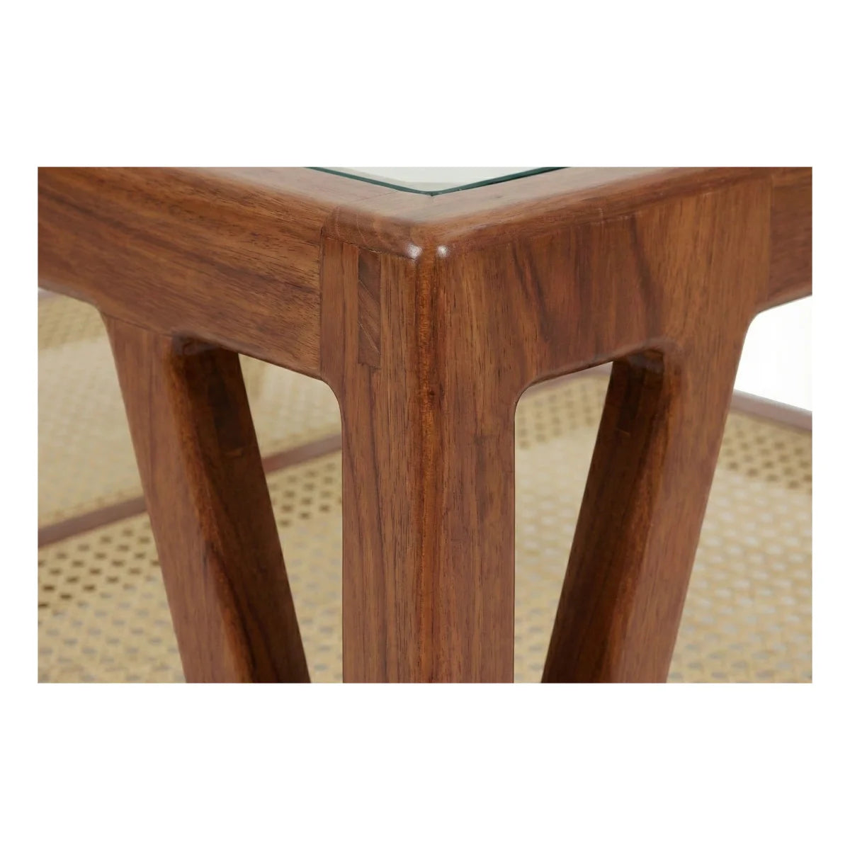 Glass top and sheesham wood corner detail of mid-century cane coffee table