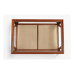 Top view of mid-century sheesham coffee table showing cane shelf through glass