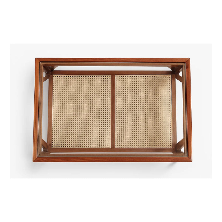 Top view of mid-century sheesham coffee table showing cane shelf through glass