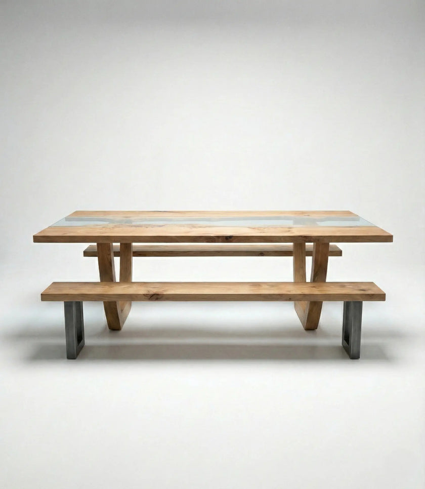 Front view of Nolan solid wood glass top dining table with matching wooden benches and metal legs.