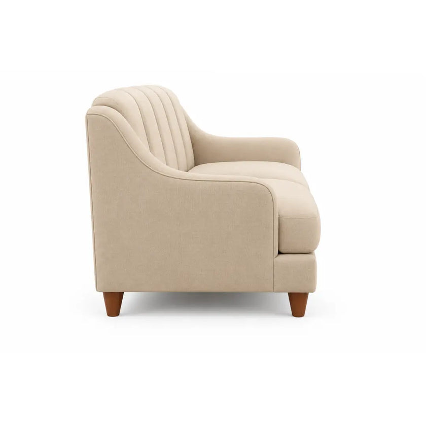 Side view of the Noorvan 2 seater beige fabric sofa showing sloped arm