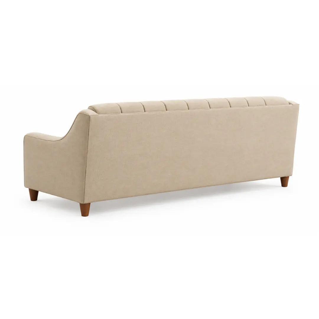 Back view of the Noorvan 3 seater beige fabric sofa with finished upholstered rear