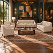 Noorvan channel-stitched beige fabric sofa set with 3 seater, 2 seater and two armchairs styled in a luxury living room